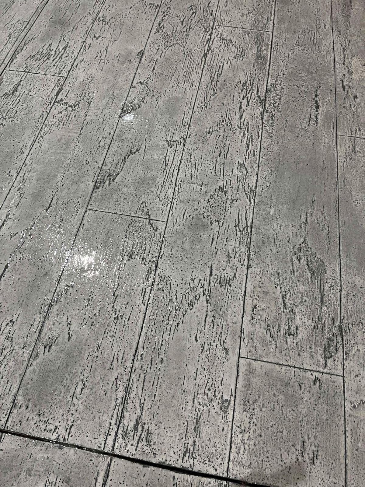 Decorative overlay finished to look like grey wood planking